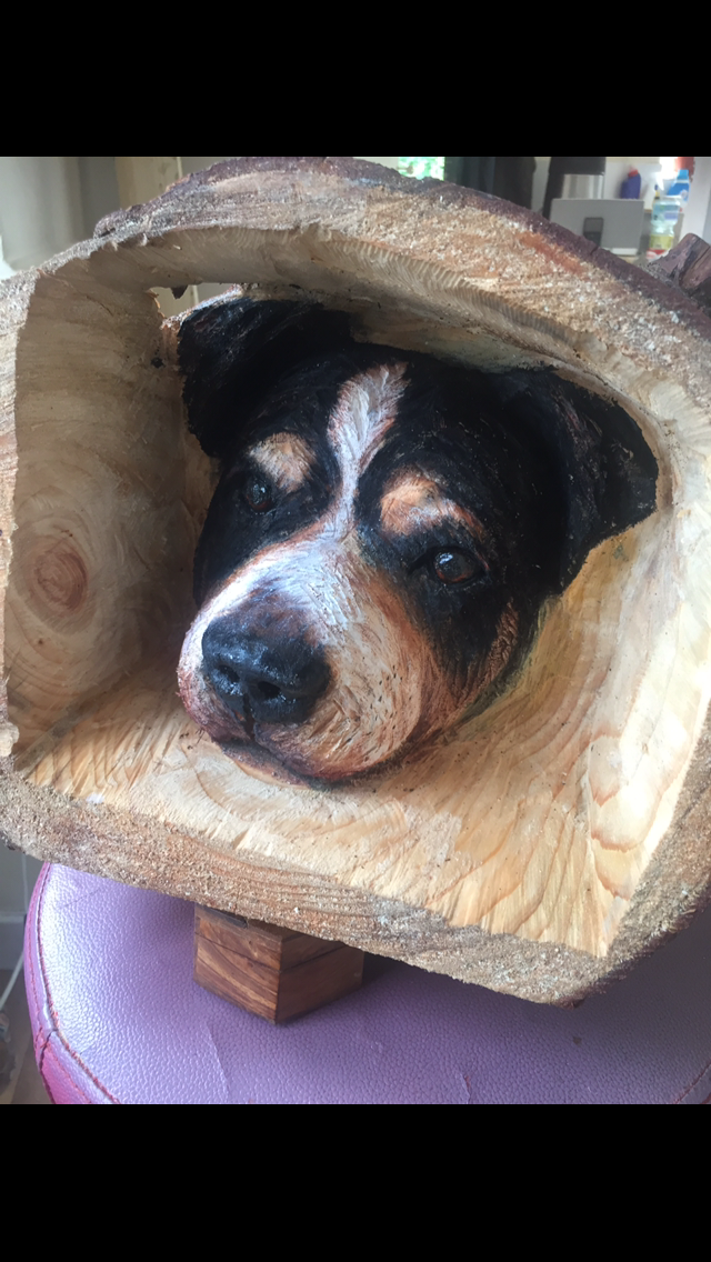 mixed breed carving with painted highlights